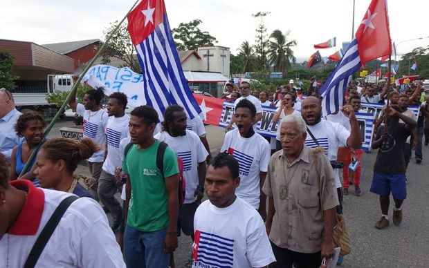 A march through the streets of Honiara in support of West Papua's bid for MSG membership