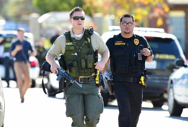 Police at the scene of the shooting on in San Bernardino, California.