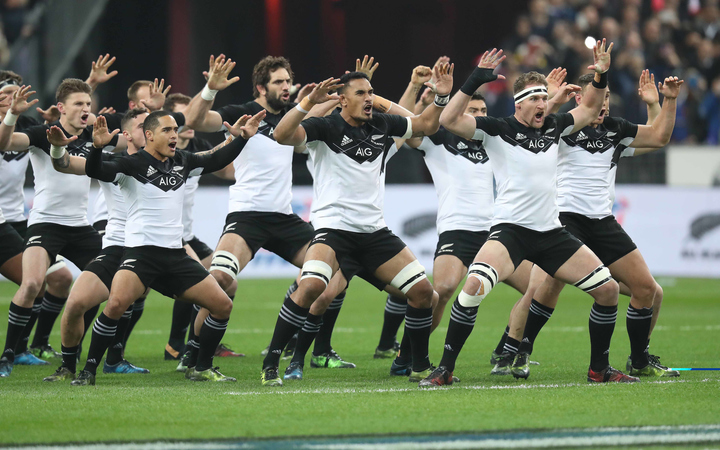 The All Blacks perform the Haka in their new jerseys in the Test against France in Paris.