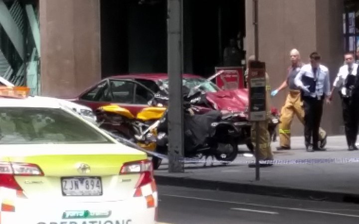 Police in Melbourne have arrested a man after a car hit pedestrians in the city centre, killing three people and injuring at least 20.  