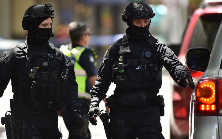 Australian SWAT police are seen on Bourke Street after a car ploughed into pedestrians in the centre of Melbourne on 20 January, 2017.