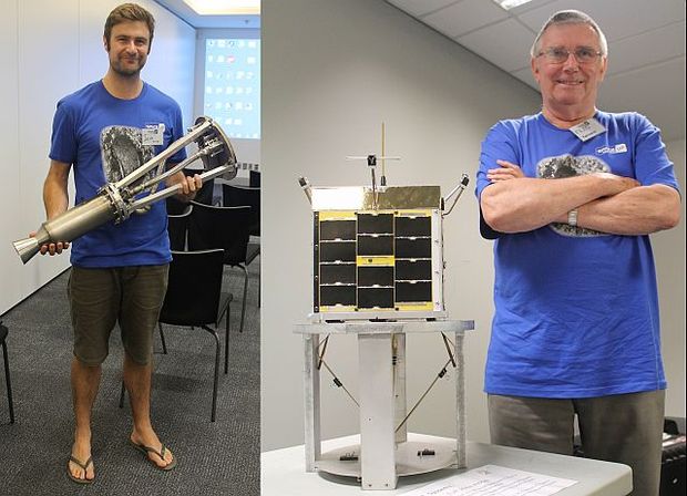 Ian Finer with his rocket engine and  Fred Kennedy with a model of Kiwisat, a homegrown satellite.