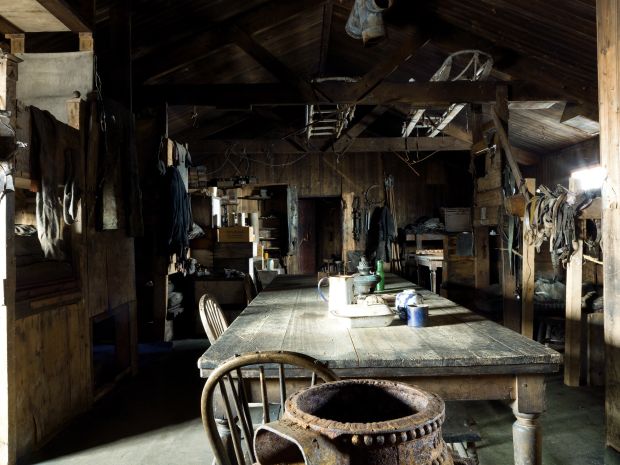 Looking back past the wardroom table to the entrance of Scotts hut Cape Evans Photo Jane Ussher