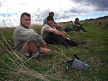 Ranger Grant Timlin join the tree-planting volunteers for a lunch break