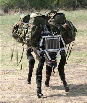 Military Robot Bio inspired Big Dog quadruped robot is being developed as a mule that can traverse difficult terrain PD BY Defense Advanced Research Projects Agency DARPA