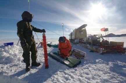 Physicists measuring the thickness of Antarctic sea ice