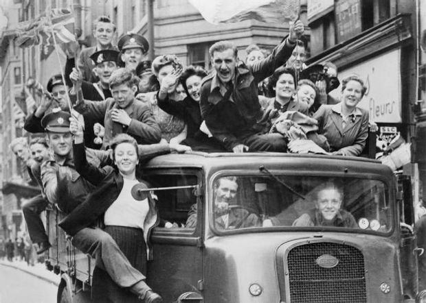 VE Day Celebrations in London May A truck of revellers passing through the Strand London