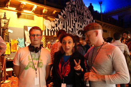 Shaun D Wilson with artists Maya Hayuk Kyle Ranson The triangular beast in the background was their creation