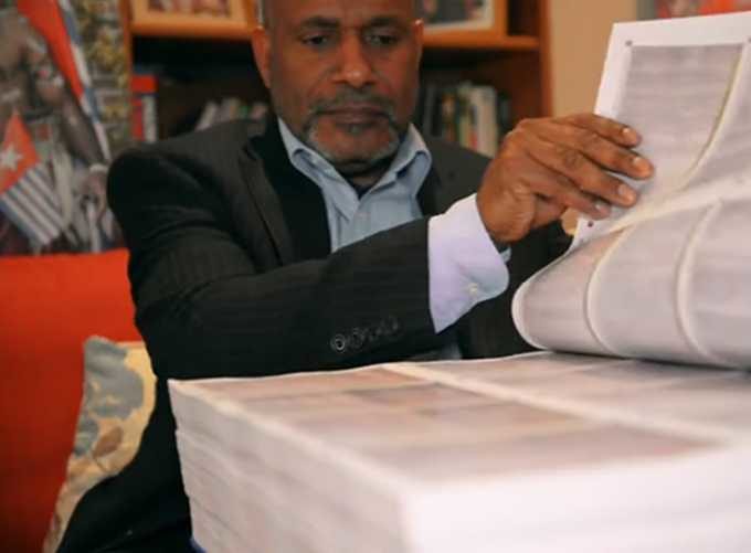 The chairman of the United Liberation Movement for West Papua, Benny Wenda, peruses the petition calling for West Papuan decolonisation.