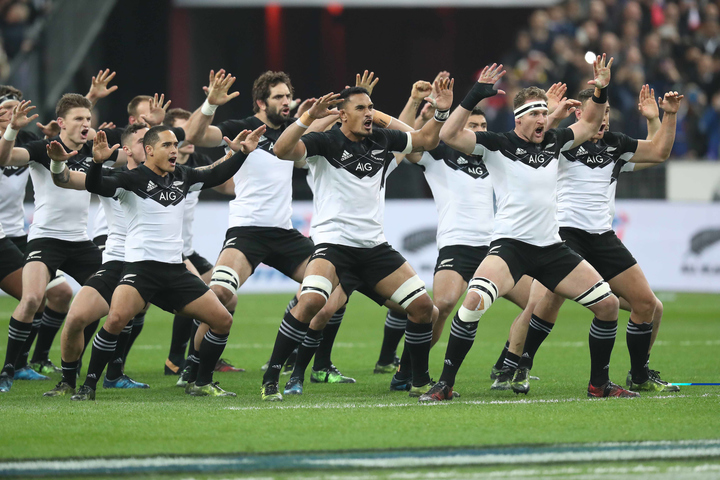 The All Blacks perform the Haka in their new jerseys in the Test against France in Paris.