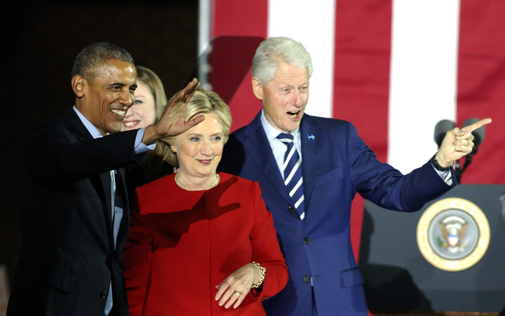 President Obama with the Clintons. 