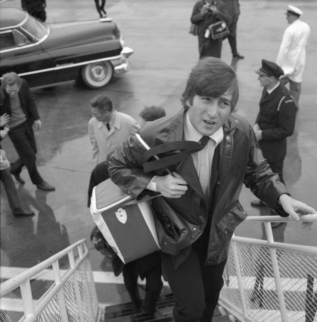 Beatle John Lennon boarding aircraft after visit to Wellington The Dominion Post Collection Alexander Turnbull Library