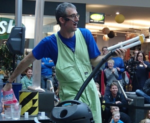 Dr Graham Walker with a vacuum cleaner bazooka that fires marshmallows