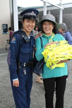 Constable Winny Kam and volunteer