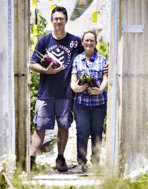 Anthony and Angela outside their greenhouses