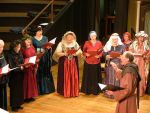 Robert Oliver conducts a medieval chorus at Feast of Fools