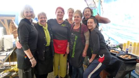 The team from Stella s Bakery in Bluff behind their food stall at The Bluff Oyster Festival