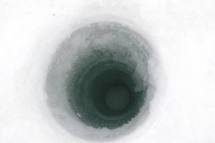 The drilled hole in the sea ice